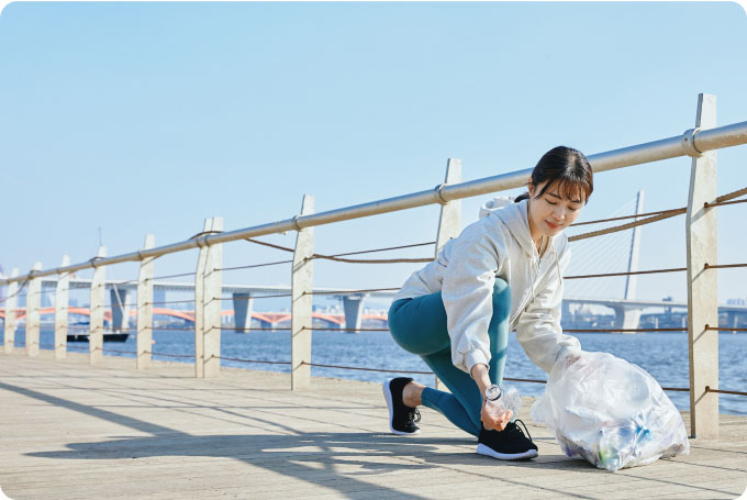 A person who picks up trash on the street